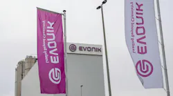 The logo of the Evonik chemical group at the Wesseling site in Germany
