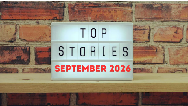 Marquee sign on mantel with a brick background reads Top Stories September 2026