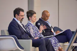 Jamie Cohen, Dow’s, vice president of R&D and industrial intermediates and infrastructure speaks at CIEX. Two other executives sit on either side of her.