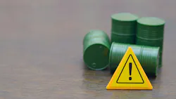 Caution Sign with Green Barrels Symbolizing Hazardous Waste and Environmental Risk