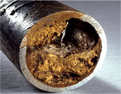 Figure 5. Pipe nearly plugged with iron oxide corrosion deposits.5
