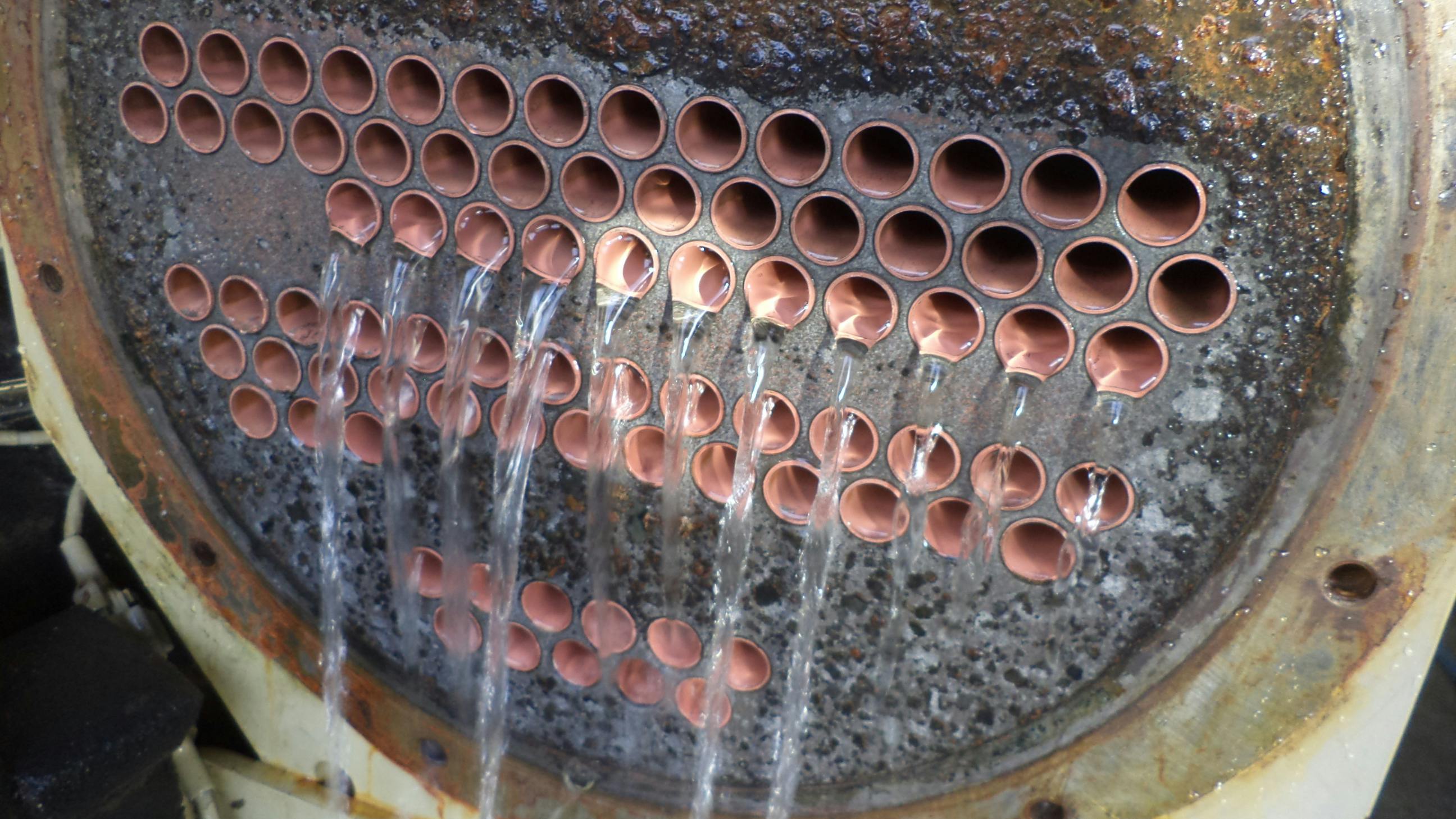 A fouled shell and tube exchanger is cleaned with chemicals