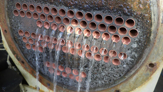 A fouled shell and tube exchanger is cleaned with chemicals