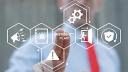 Business professional interacting with a digital emergency plan interface featuring icons for alerts, first aid, evacuation, safety procedures, equipment and hazard warnings