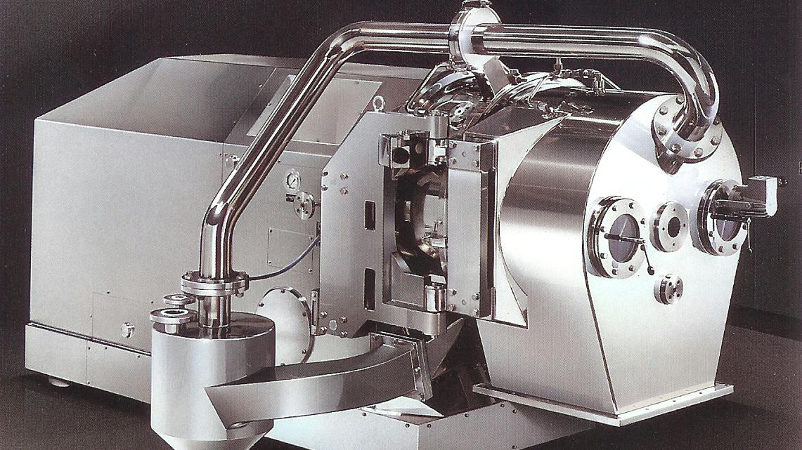 In an inverting filter centrifuge, the filter cloth inverts inside-out at high speed to roll the cake off the basket without a mechanical blade contacting the product.