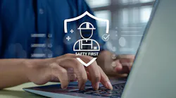 Person using a laptop with a digital safety interface overlay featuring a hard hat, protective shield, checkmark and the words ‘Safety First,’ representing workplace safety management and risk prevention
